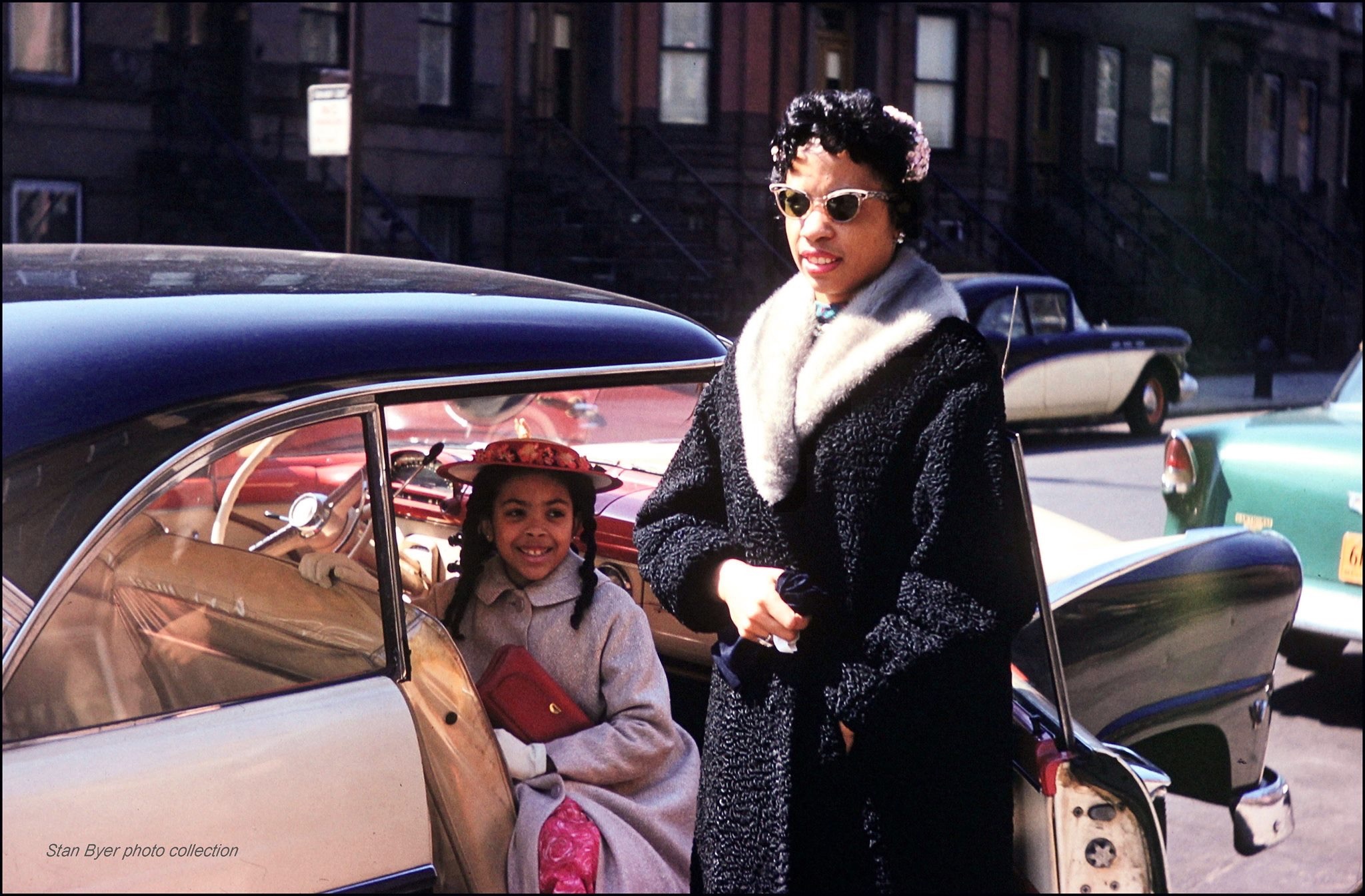 A young Karen with her mother on a city street
